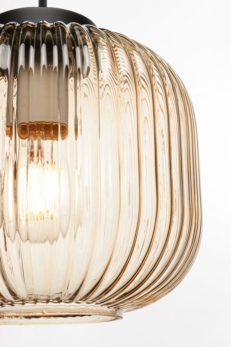reeded glass shade in amber featuring vertical ridges across its surface