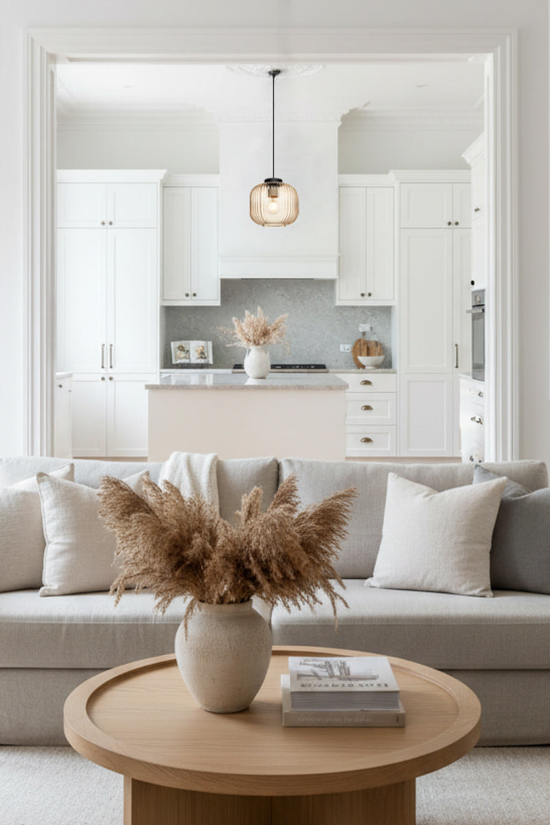 Amber reeded glass pendant over a contemporary kitchen space. 