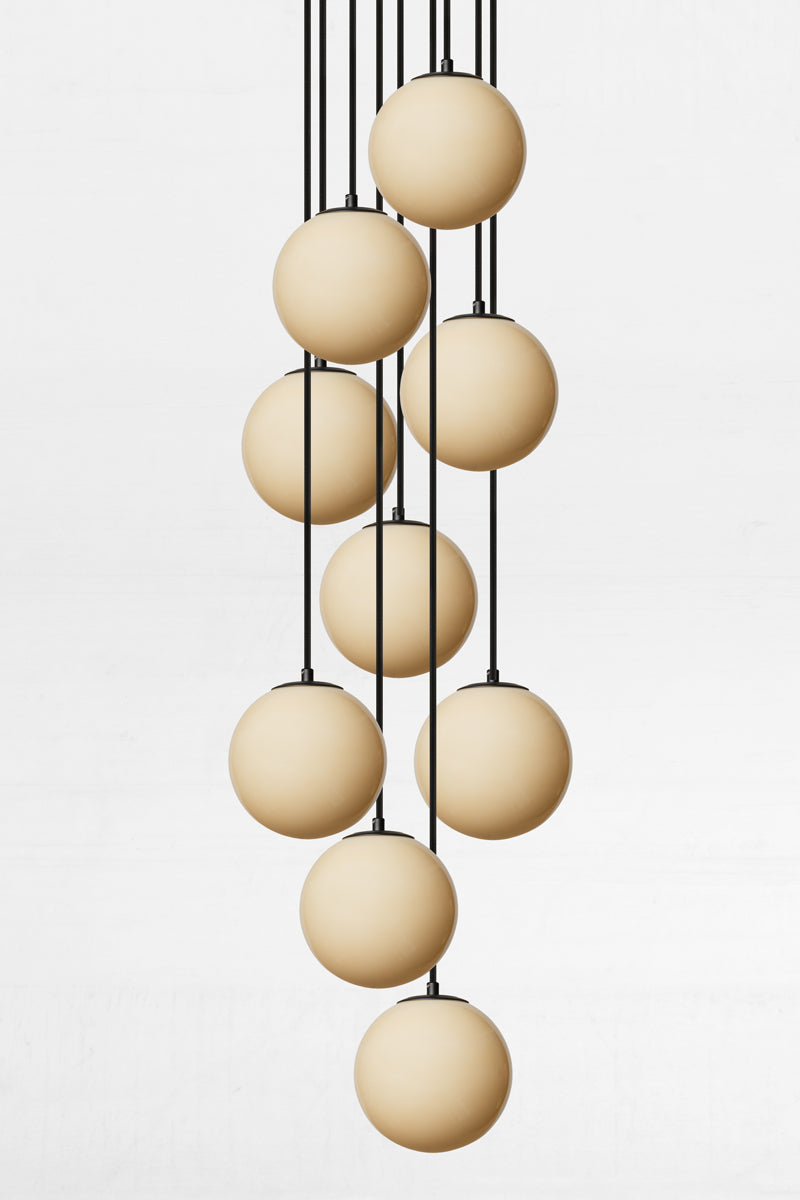 9 light multi drop chandelier with amber glass ball shades. 