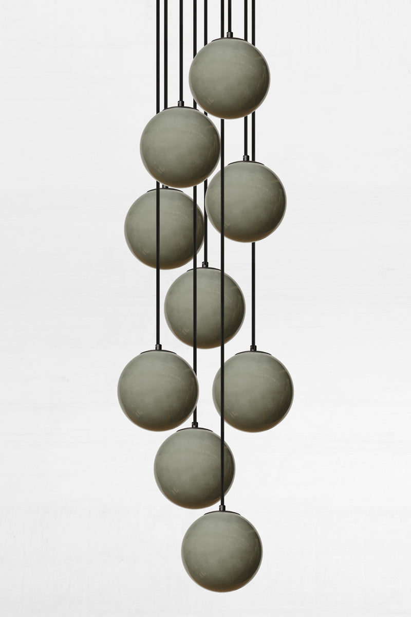 9 light multi chandelier with light grey glass ball shadees. 