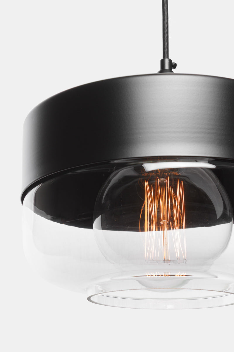 Close up of silhuette A of the Dalston industrial/ modern glass and metal pendant light. 