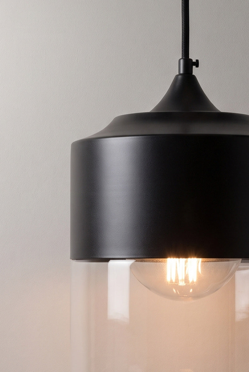 Close up of silhuette C of the Dalston industrial/ modern glass and metal pendant light. 