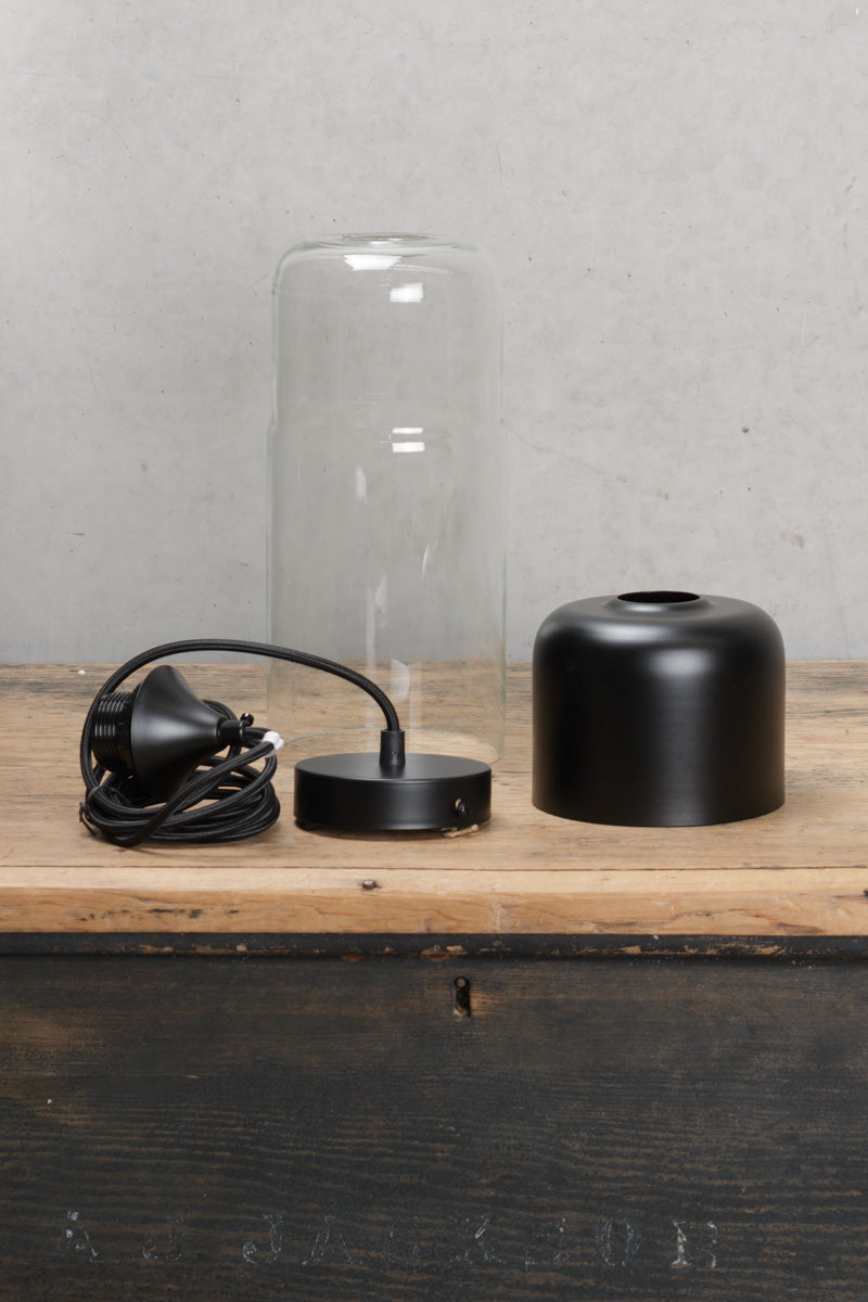 Uninstalled Silhuette C glass and metal pendant light, with black pendant cord. 