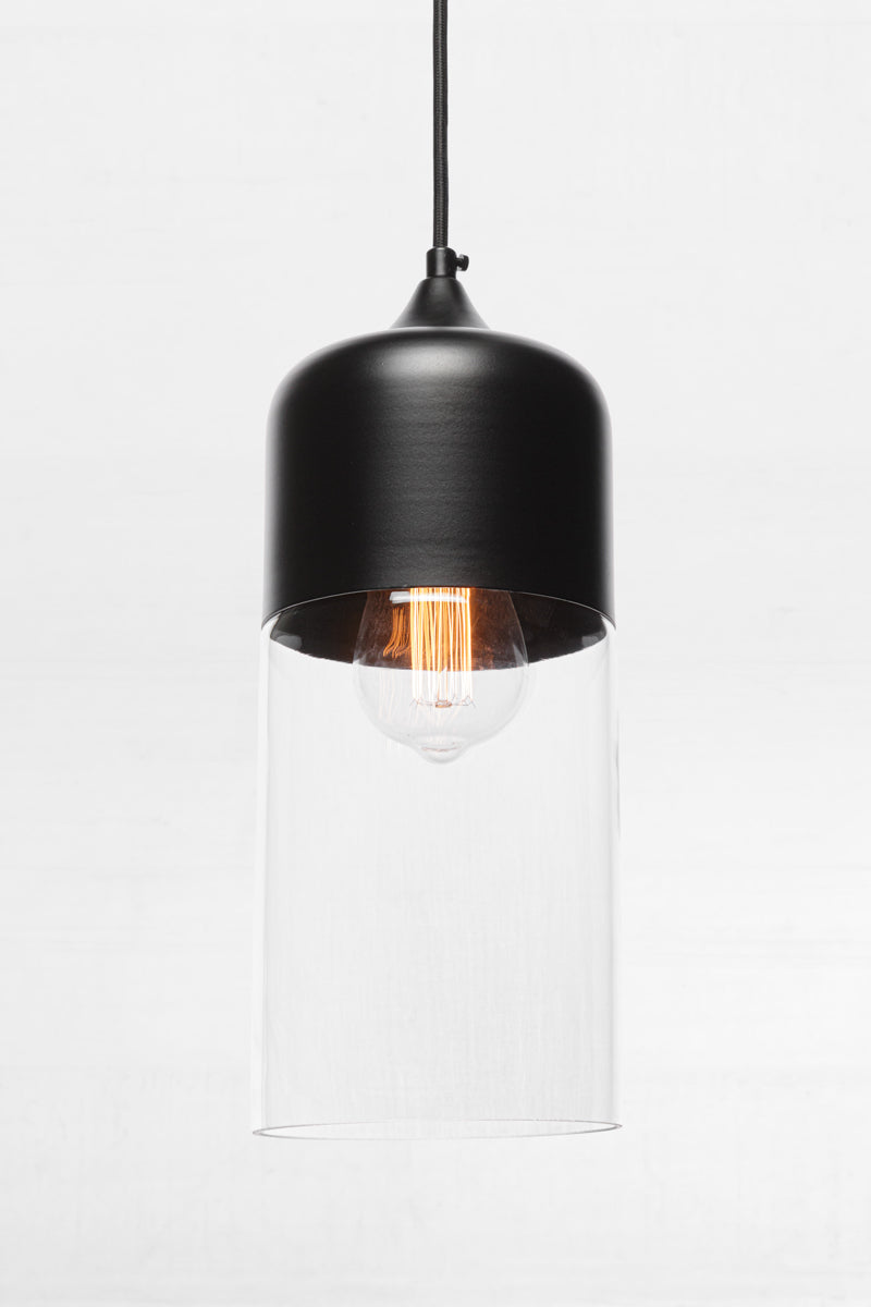 Silhuette C of the Dalston industrial/ modern glass and metal pendant light. Paired with a clear bulb. 