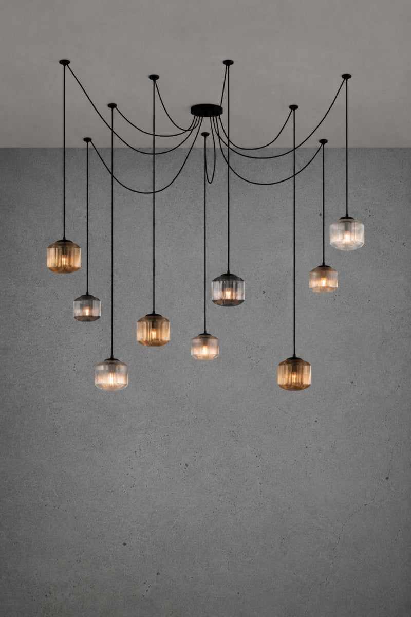 9 drop chanderlier with amber, clear and grey, reeded glass shades and black cord and hardware. 