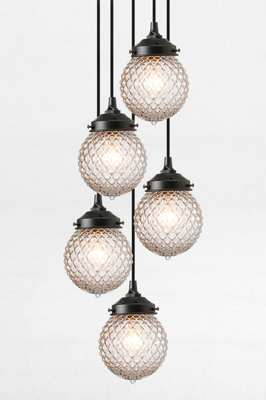 5 Drop multi light with vintage inspired textured clear glass shades. 