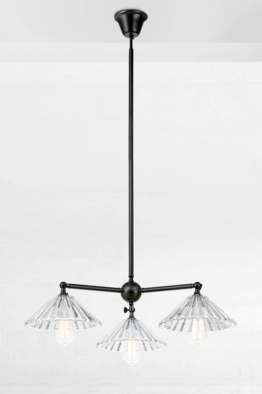 Black three light pendant with tiltable lampholders and three pleated glass shades. 