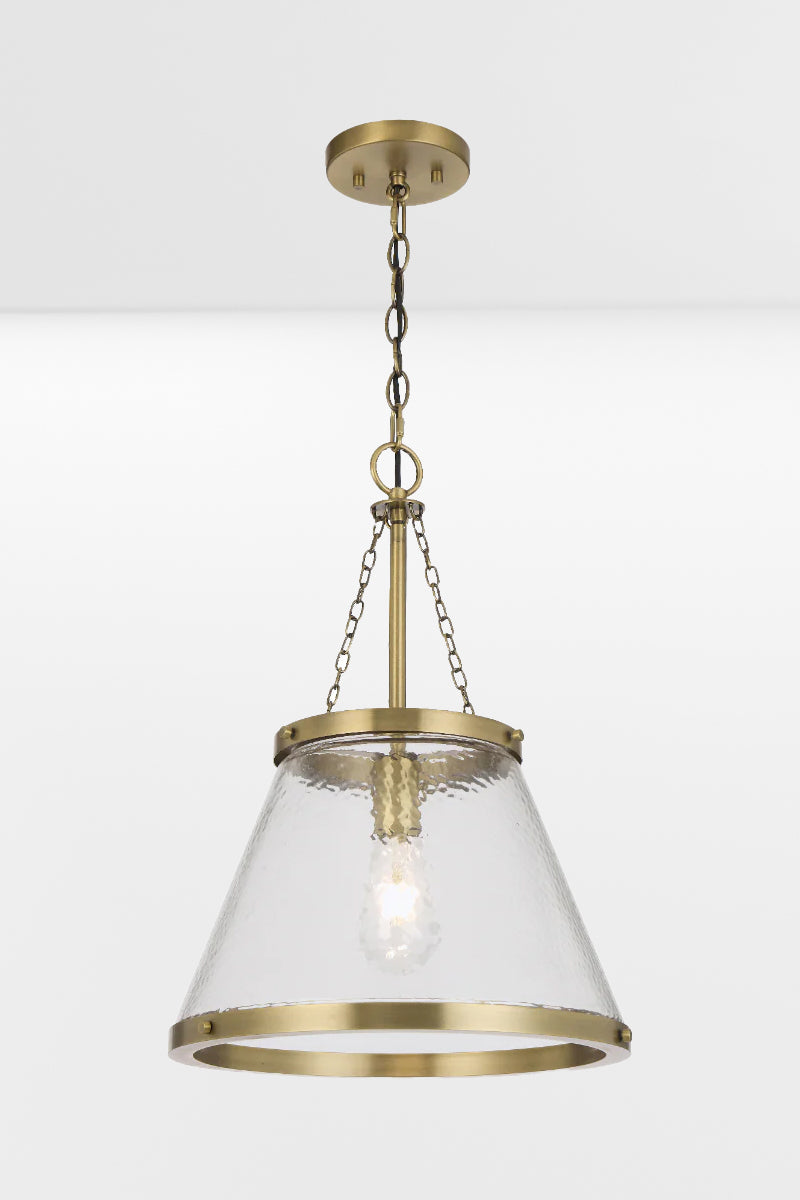 Gold/brass cone shade pendant light with textured glass. 