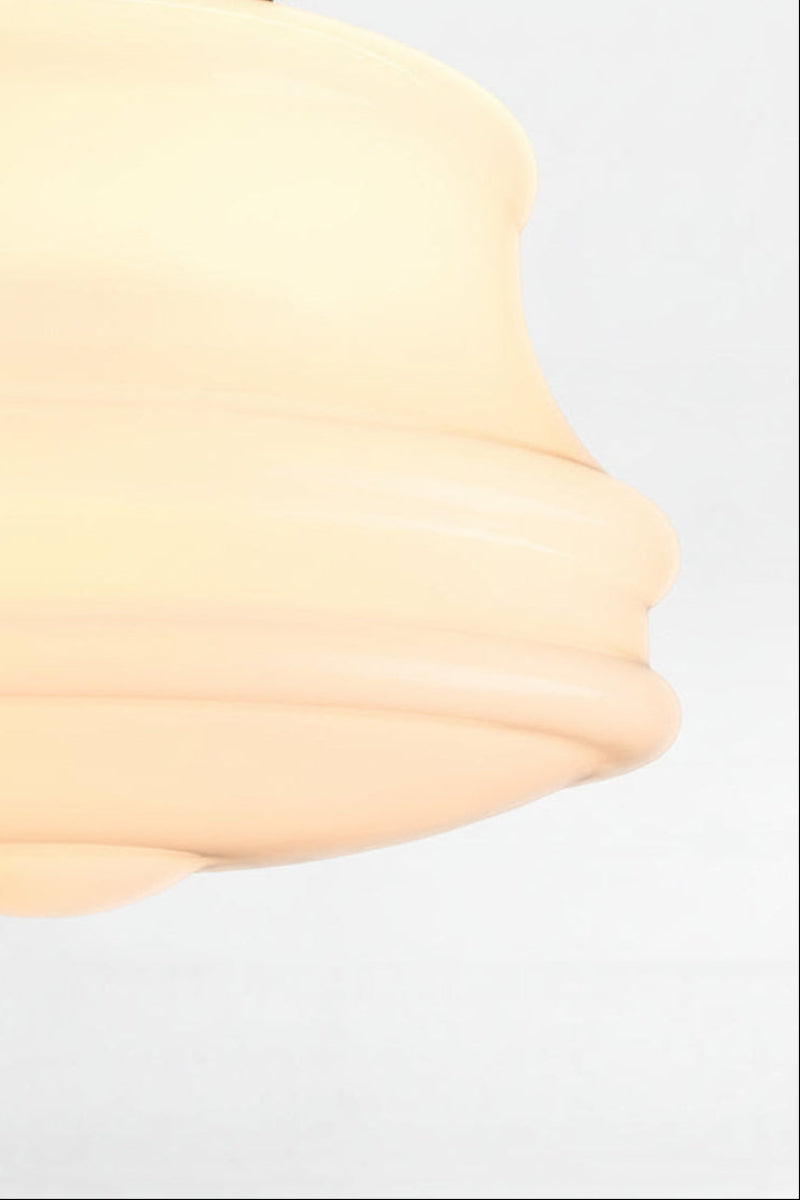Classic glass light school house shade with an opal finish. 