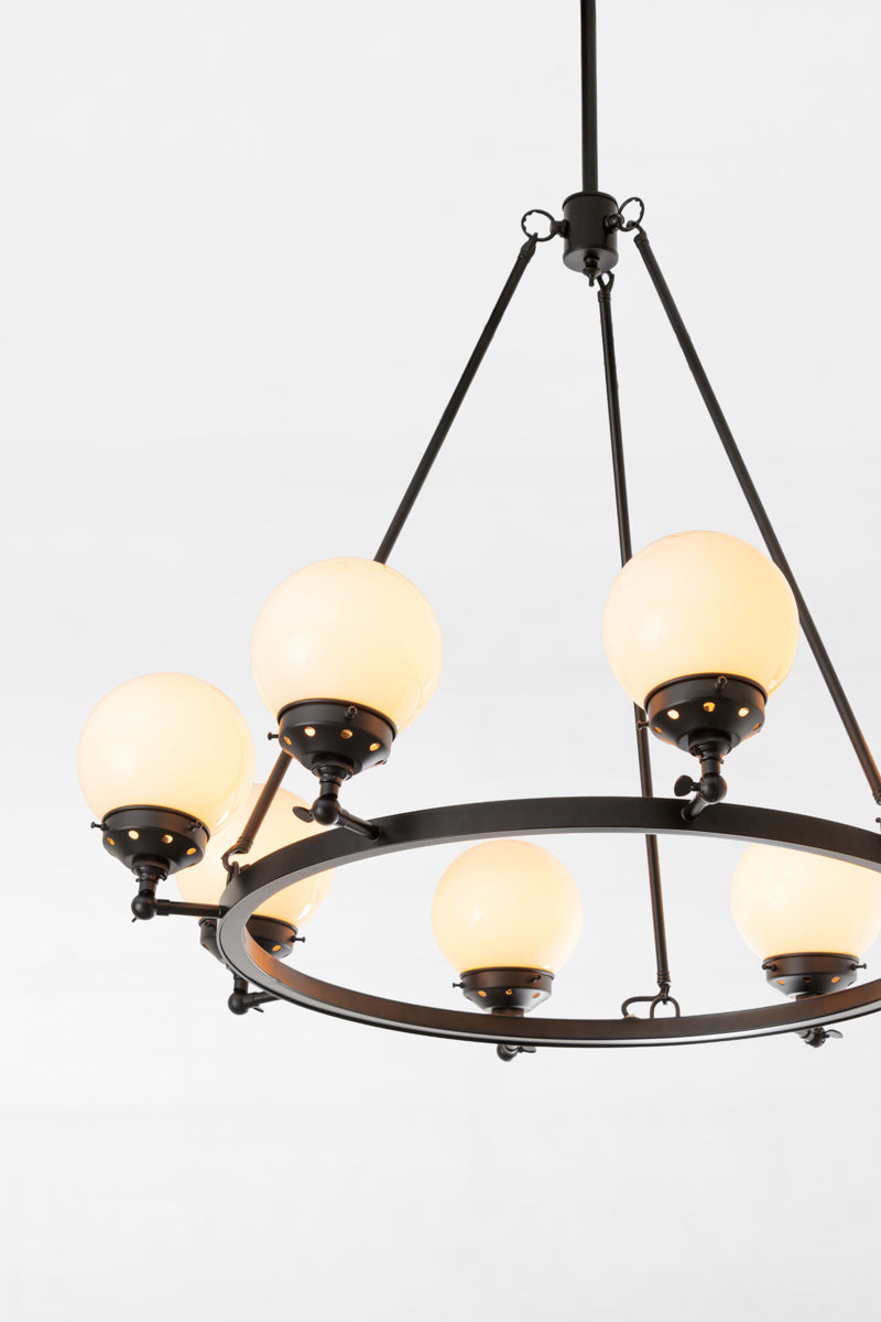 Simple but striking black frame design with 8 glass sphere shades, perfect for spacious rooms