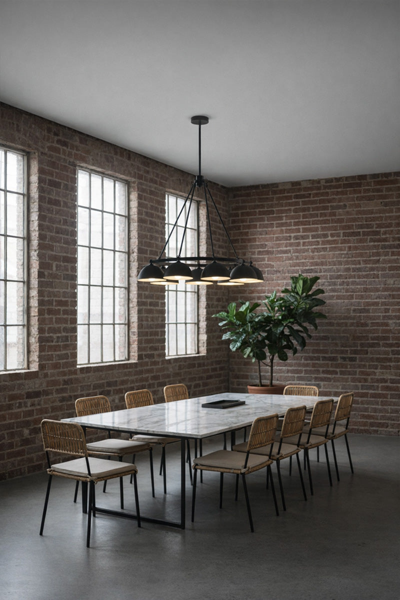 Modern conference room with brick walls, large windows, and a Dome 8 Light Circular Chandelier