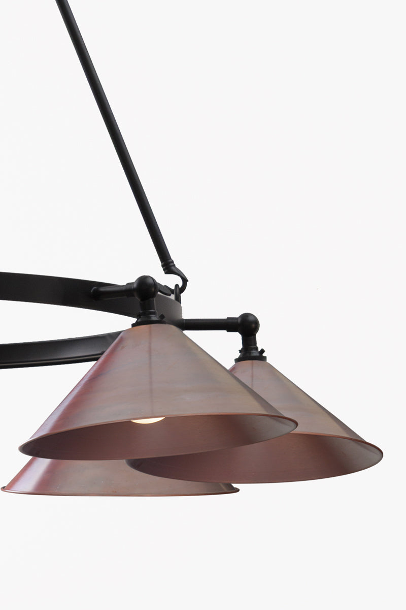 Aged Copper cone shades on the 8lt circular chandelier