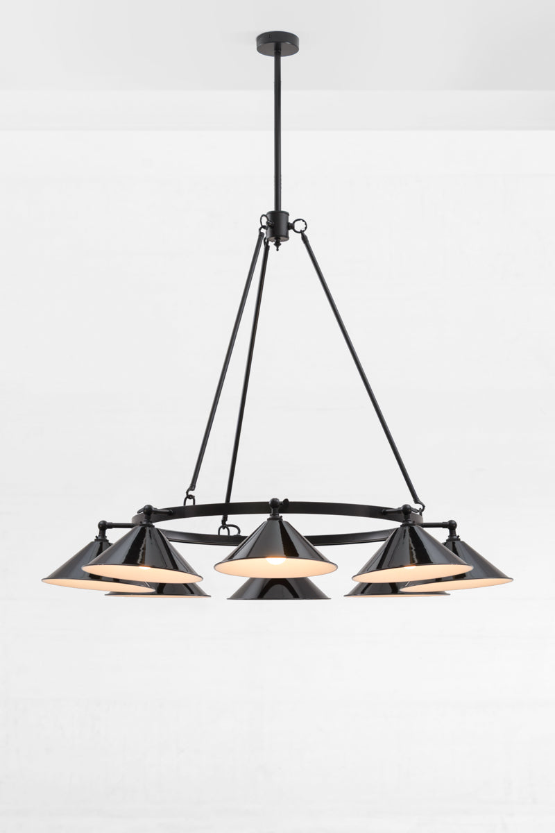 Eight light black, circular chandelier with black cone shades, facing down.  
