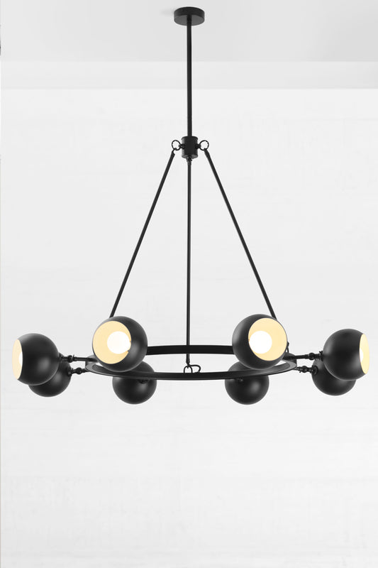 8 light bulb shade circular chandelier in black with white inner shade, with lampholders facing out.