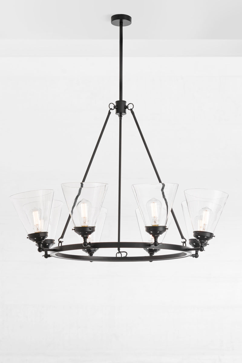 Black 8 light cirlcular chandelier with large clear glass cone shades. 
