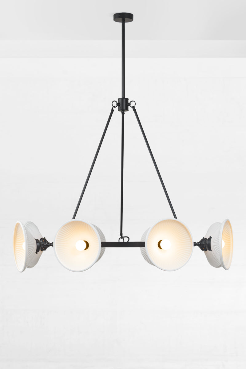 8 light circular chandelier with white ceramic shades facing out.