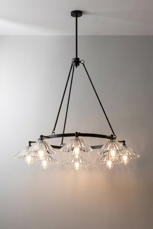 Black 8 light circular chandelier with 8 clear pleated conical shades facing down. 