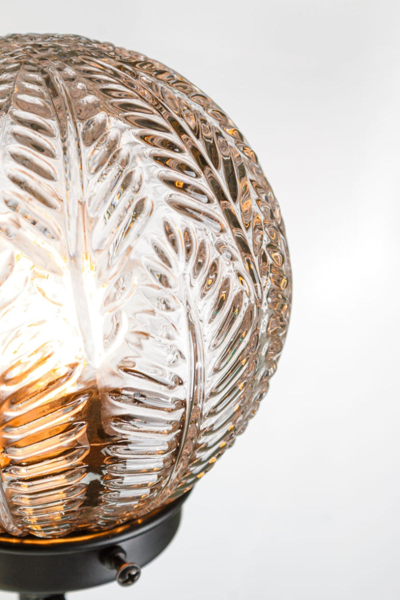 Close up of the vintage inspired clear glass shades. 