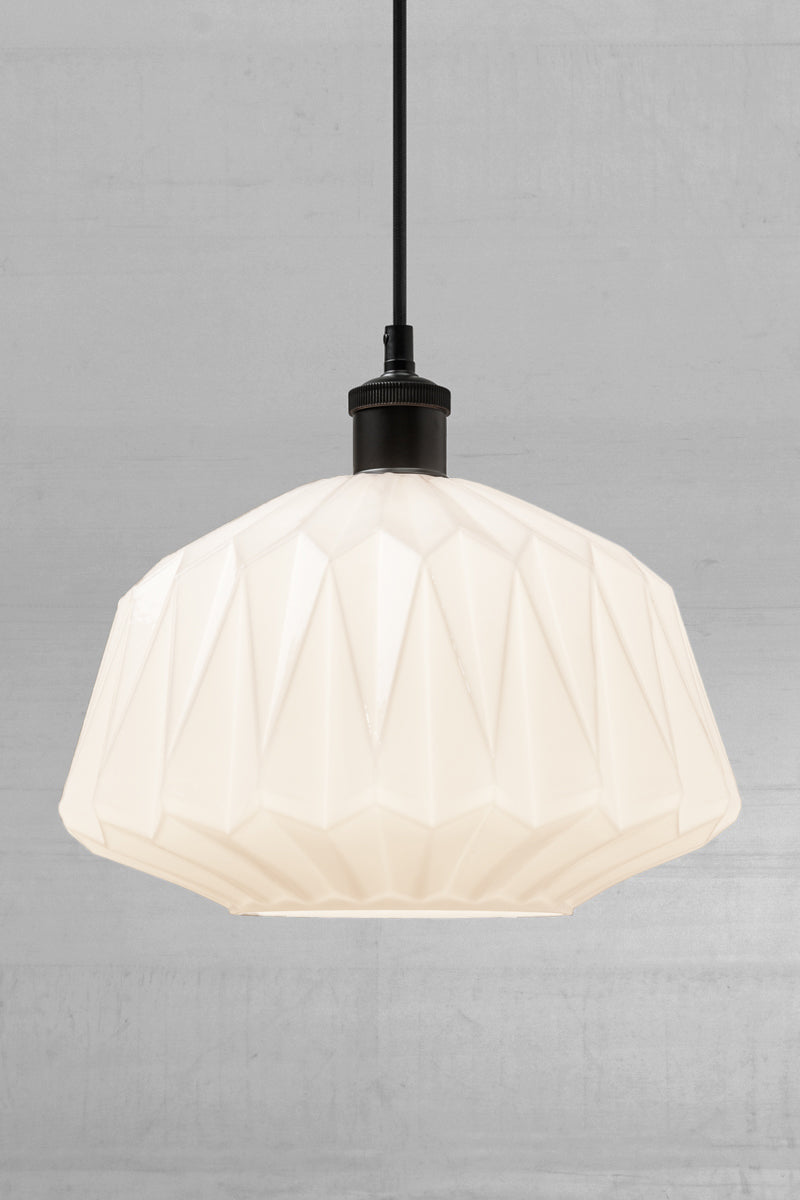 Opal geometric shade with a black lampholder and cord. 