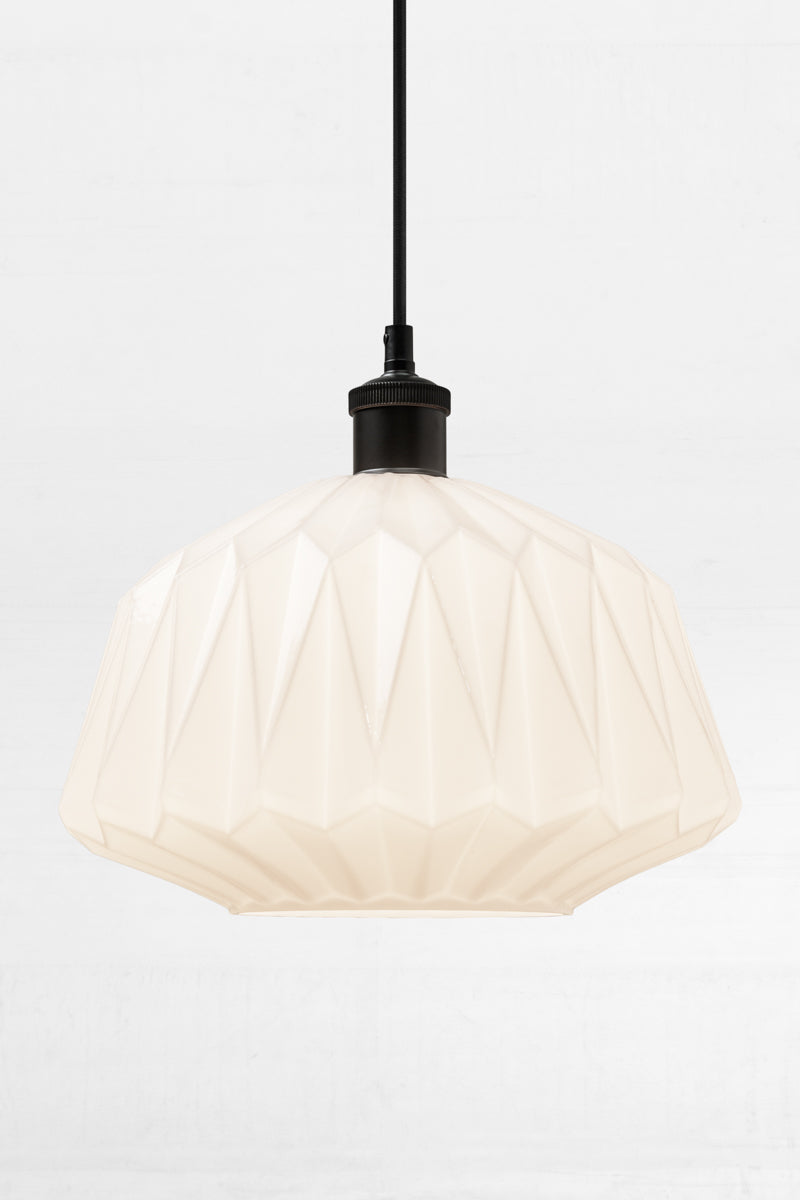 Opal geometric shade with a black lampholder and cord. 