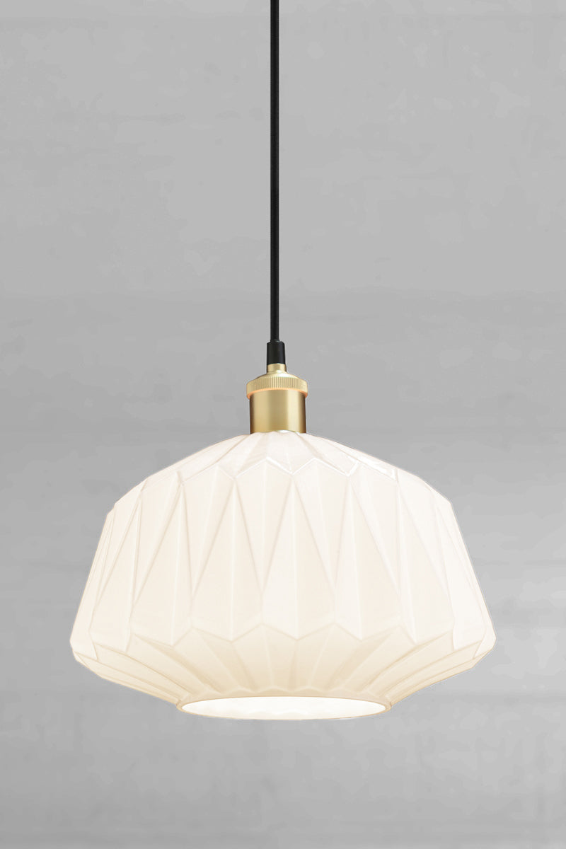 The opal geometric shade with a gold/brass lampholder and cord. 