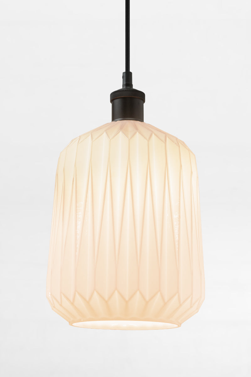 Opal shade with geometric design on a black pendant cord. 