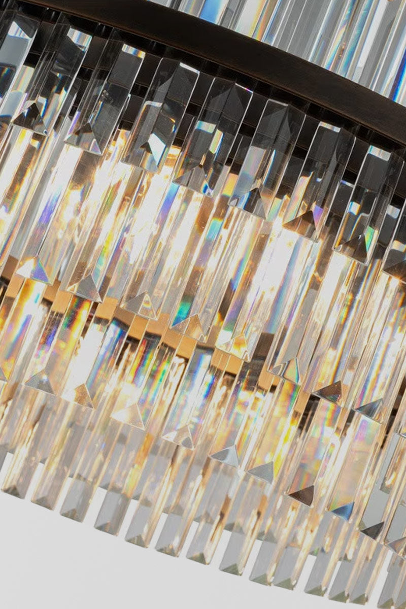 Close up of the glass prisms of the large chandelier. 