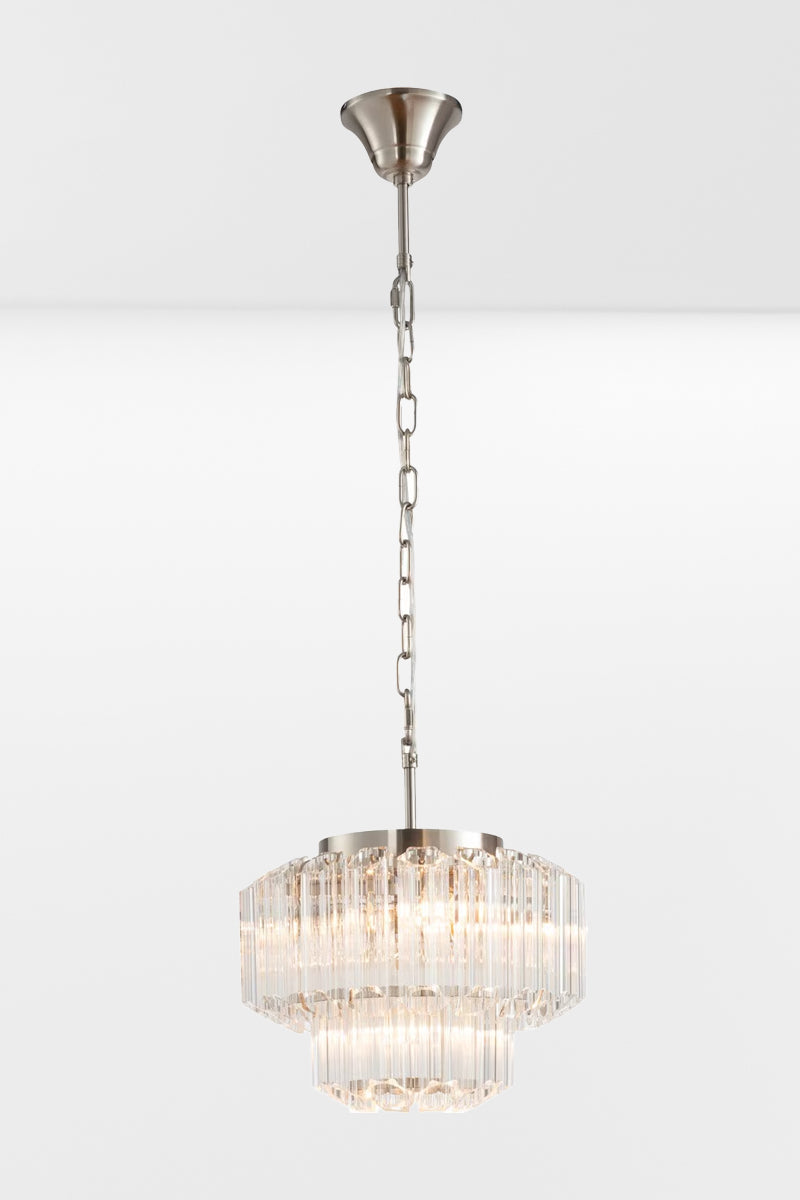 Small glass chandelier with chrome finished metalware.