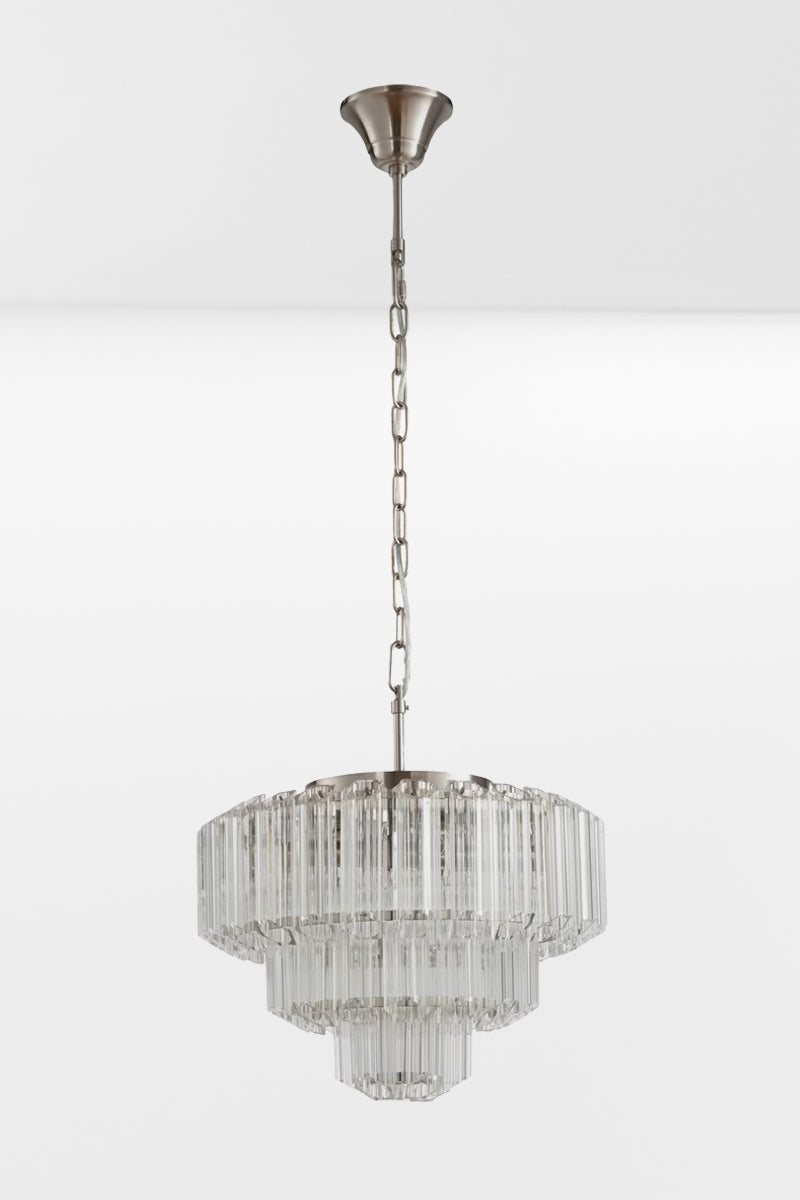 Medium glass chandelier with chrome finished metalware with the lights off.