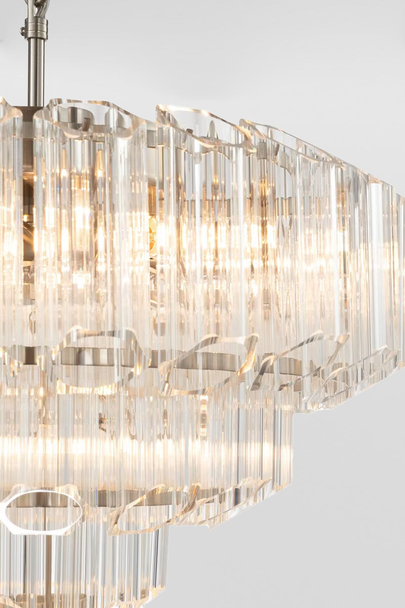 Close up of the large chandeliers three glass tiers.