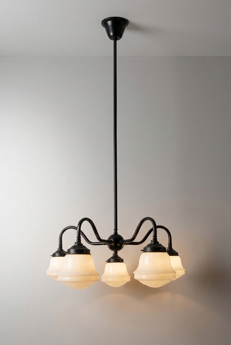 Colton Schoolhouse five light Gooseneck Chandelier in black with illuminated opal glass shades.