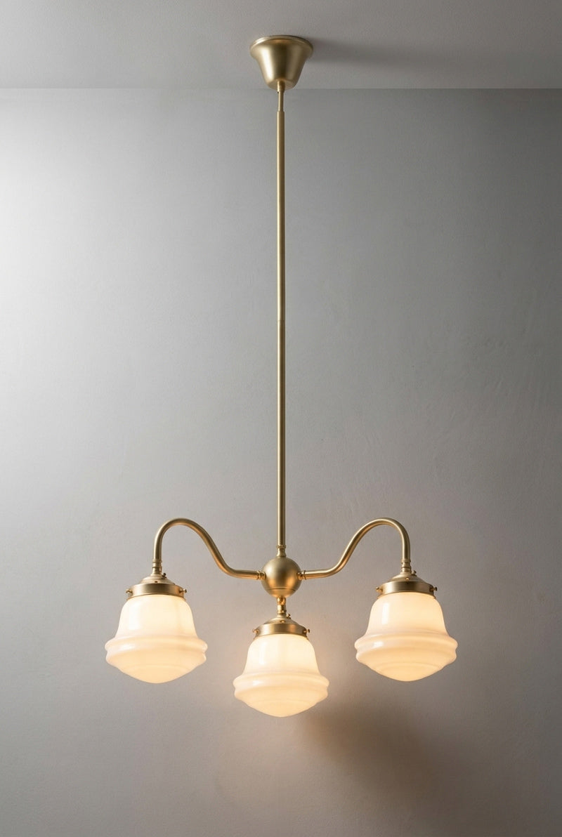 Colton Schoolhouse three light Gooseneck Chandelier in gold brass with opal glass Schoolhouse shades.