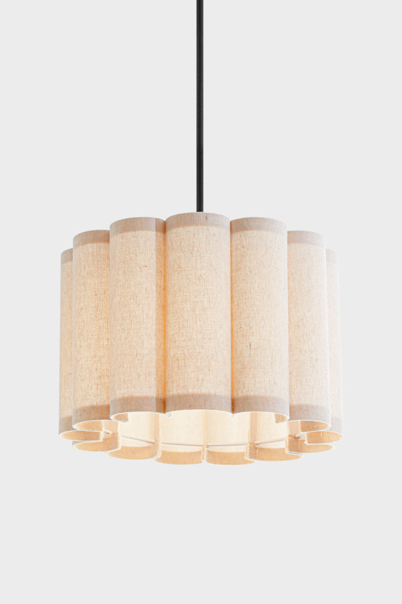 Beige/ neutral coloured fabric shade with a scalloped silhouette, paired with a black pendant cord.