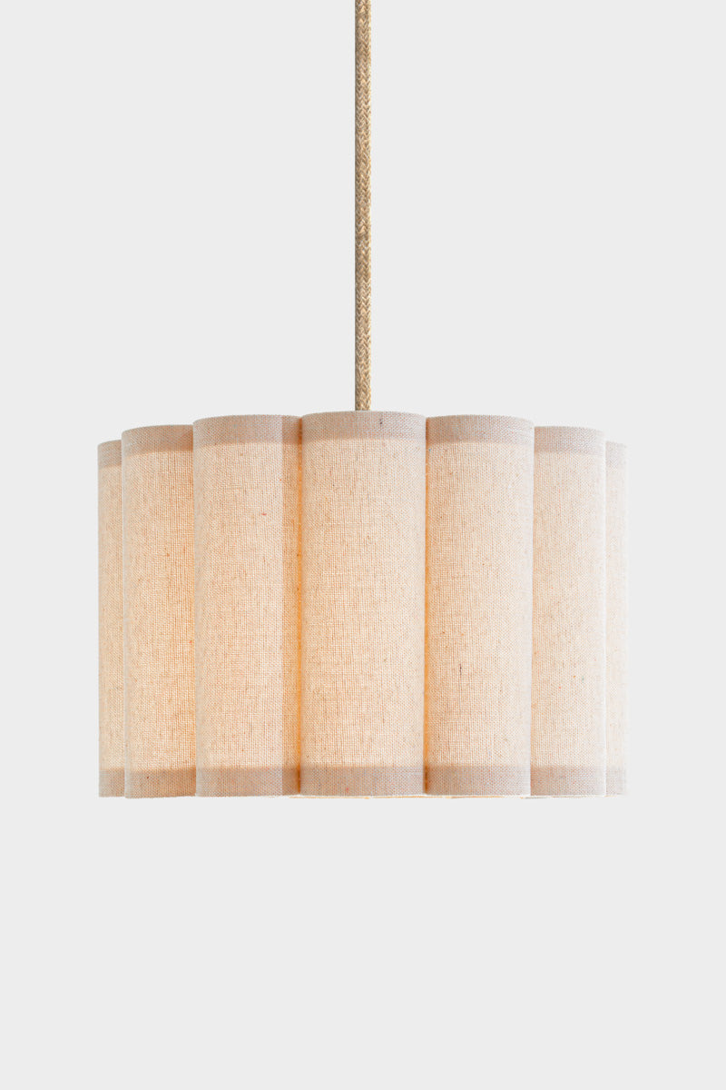 Beige/ neutral coloured fabric shade with a scalloped silhouette, paired with a jute pendant cord.