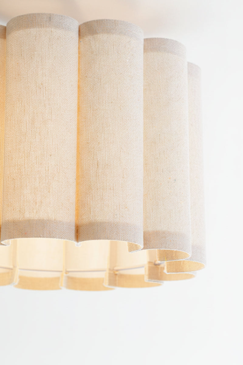 Small fabric scalloped shade ceiling light. 