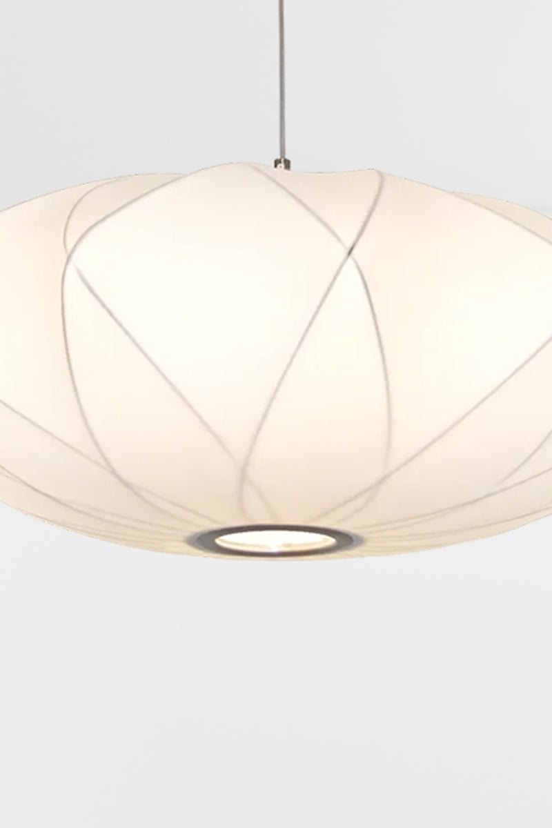 Close up of the wire framed shade with white fabric sretched over. 