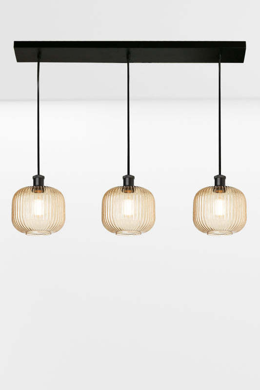 3 light linear multi pendant light with amber reeded open glass shades in an even row. 
