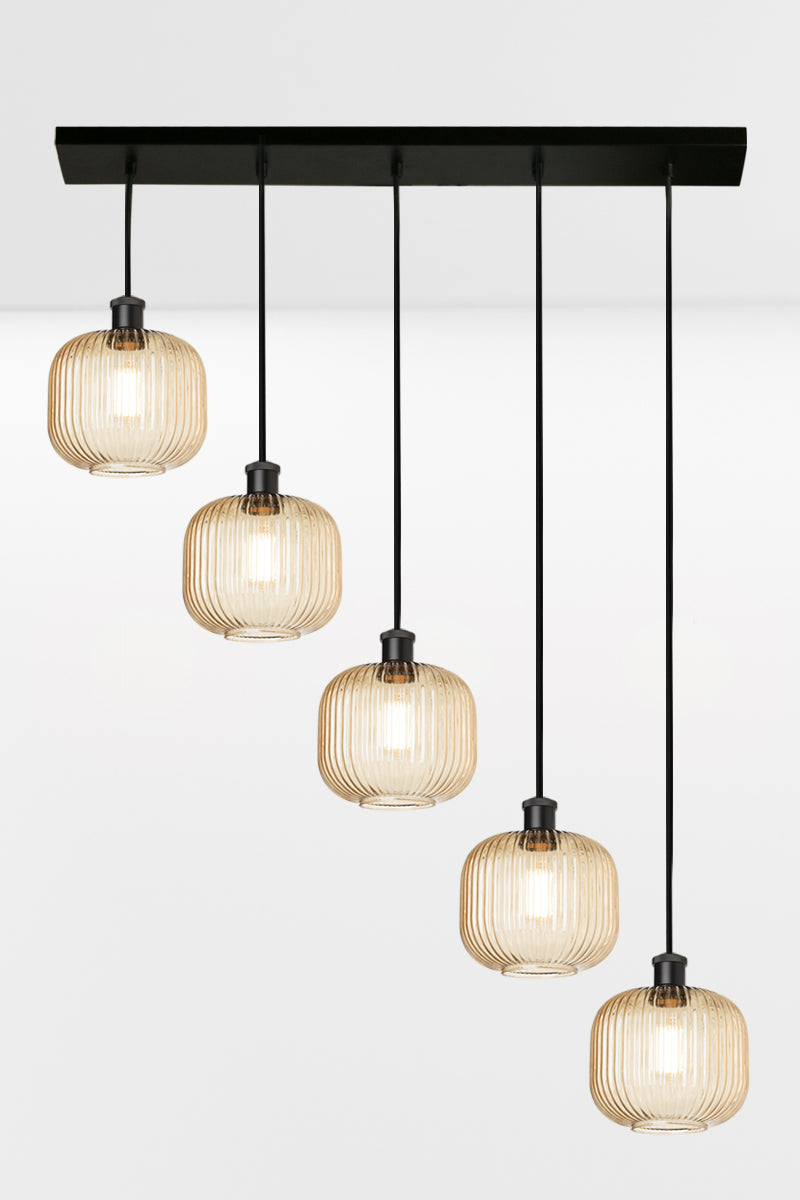 5 light linear multi pendant light with amber reeded open glass shades in a descending formation. 