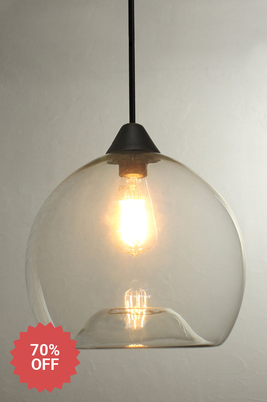 Clear glass shade with black pole suspension