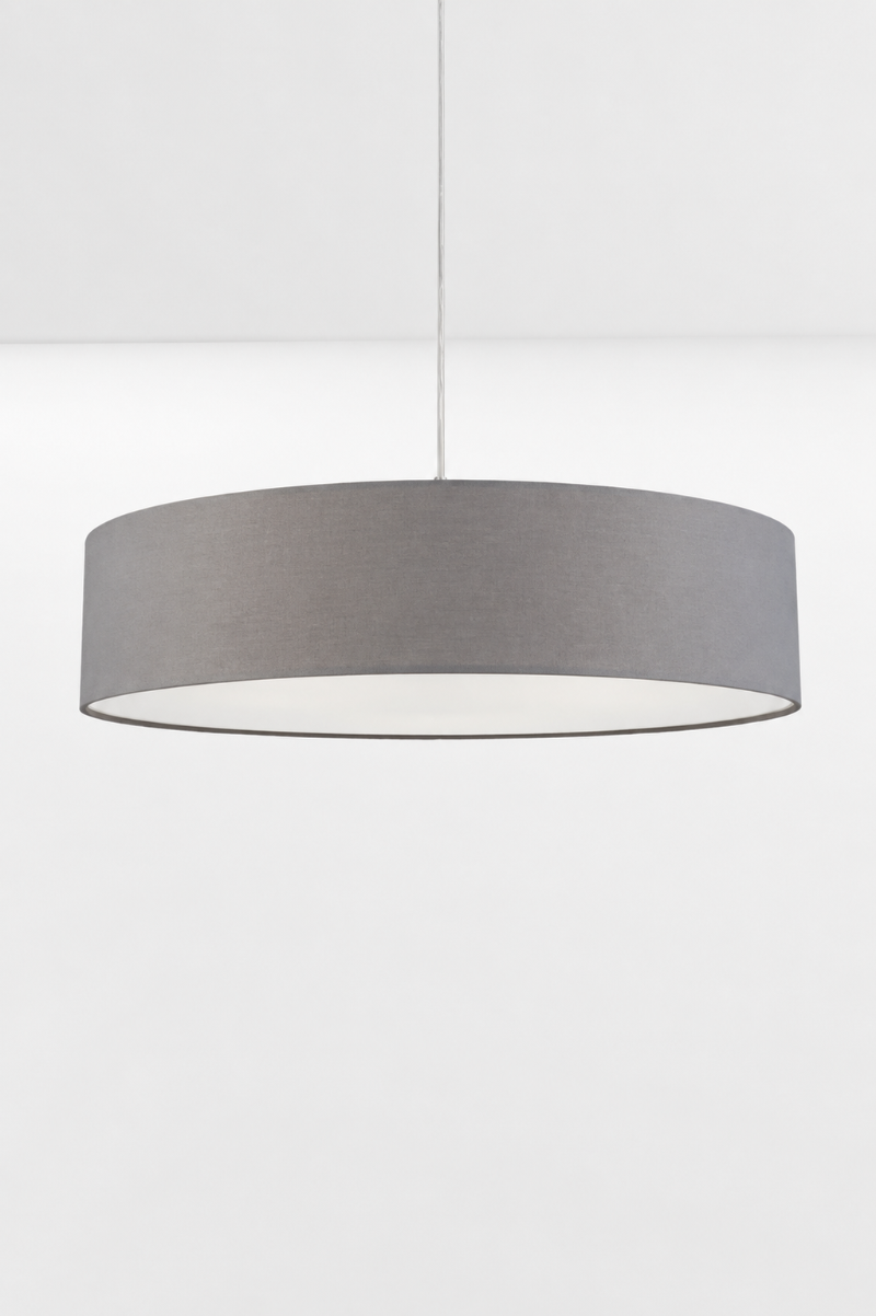 Clemente white fabric pendant light with a cylindrical drum shade and white fabric suspension cord.