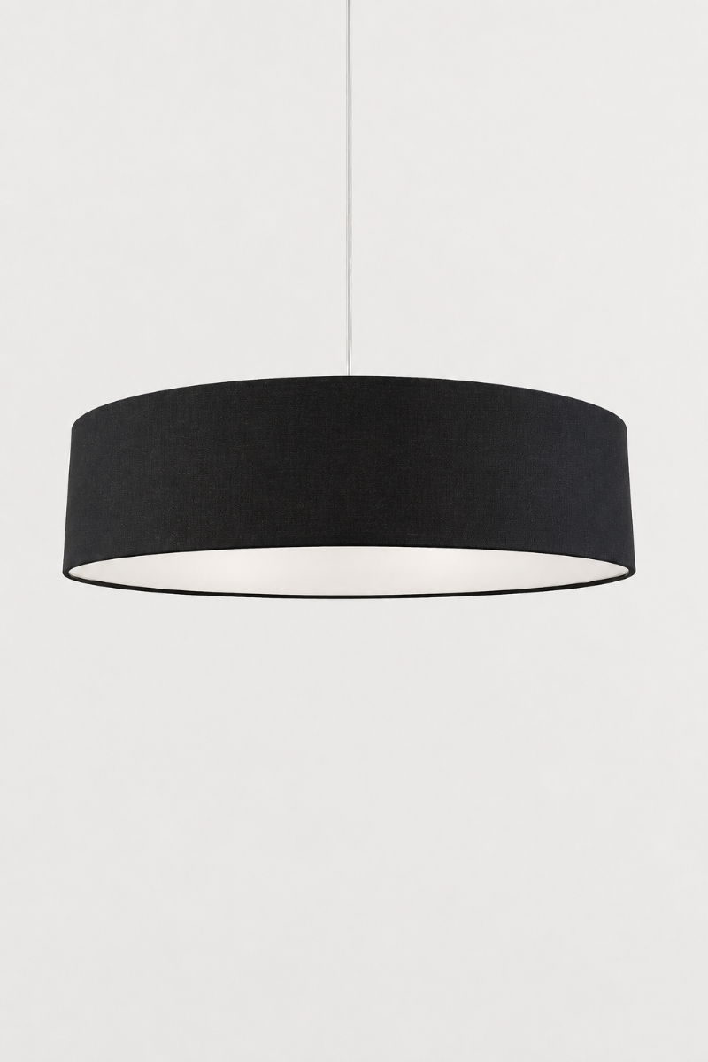 Clemente black fabric drum pendant light with a modern cylindrical shade and black fabric suspension cord.
