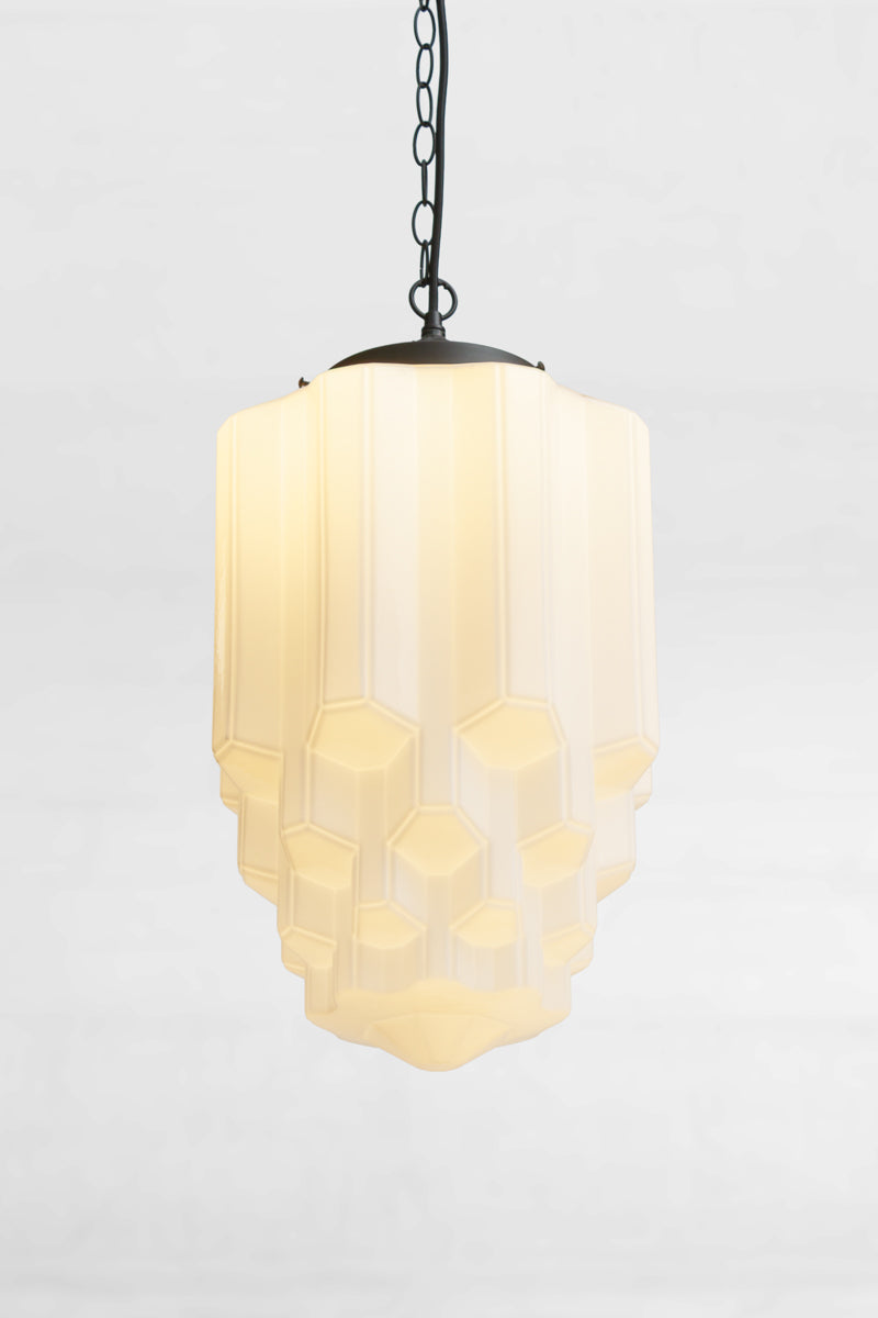 art deco style light with complex sculptural glass shade with vertical fluting&nbsp;and hexagonal detailing