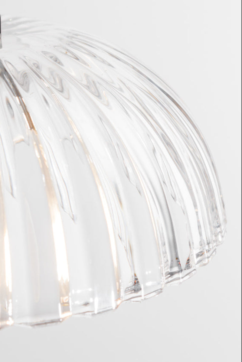 Close up of the fluting on the clear glass shade. 