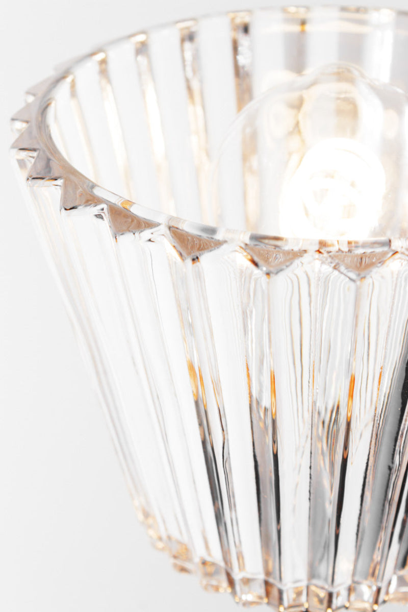 Scalloped edge of the Davis clear glass shade. 