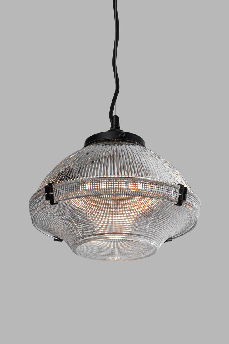 Front angled view of the Glass Pendant Light featuring a two piece clear optical glass shade with rippled and holophane textures.