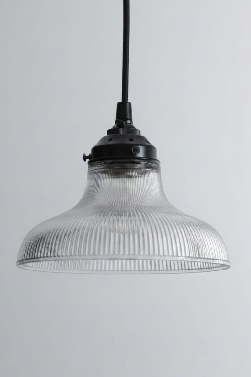 Distinctive holophane detailing gives the clear glass shades depth, texture and vintage appeal