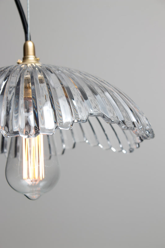 Close-up of Hepburn Glass Pendant Light showing the clear fluted glass shade and detailed rippled edge