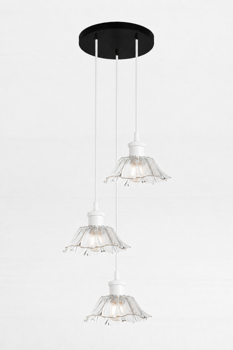 Honfleur Glass Multi Drop Pendant with 3 clear fluted glass shades suspended at staggered heights on white pendant cords.