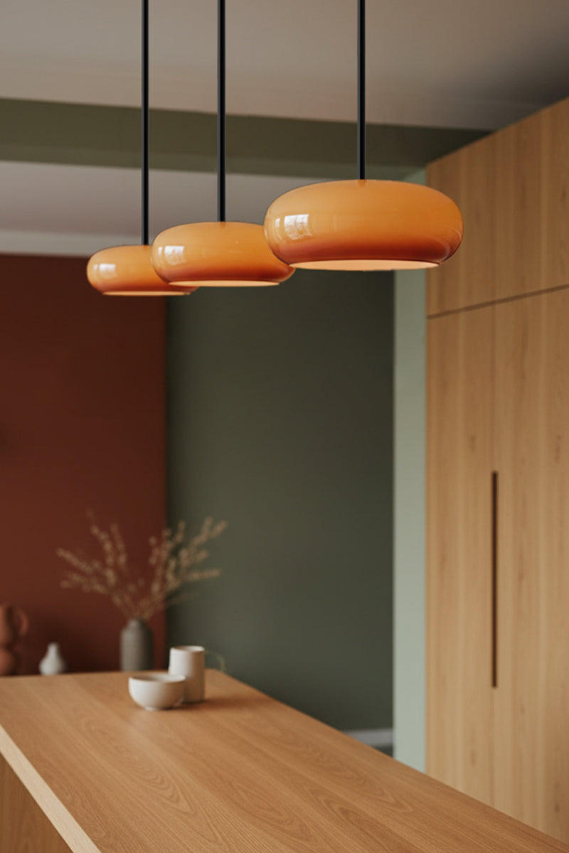 Modern kitchen with wooden counter, 3 avoca pendant lights hanging above