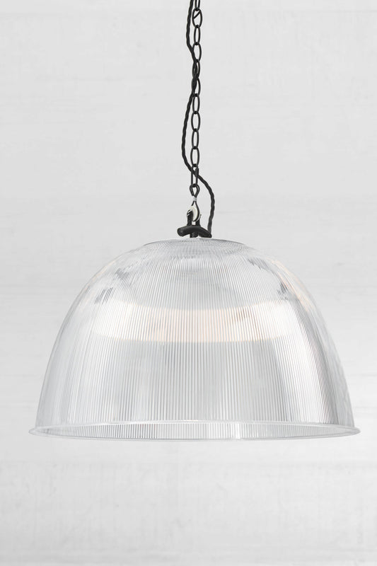 Large clear prismatic pendant with black industrial chain style pendant suspension